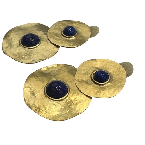 44 - A set of contemporary earrings, gold discs with blue central stones, in a Kenneth Jay Lane dust cove... 