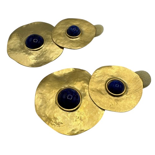 44 - A set of contemporary earrings, gold discs with blue central stones, in a Kenneth Jay Lane dust cove... 