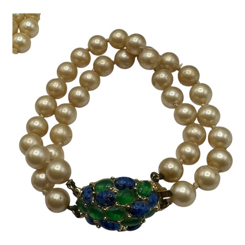 49 - A vintage matching pearl bracelet and double row pearl necklace, each with a blue and green stone de... 