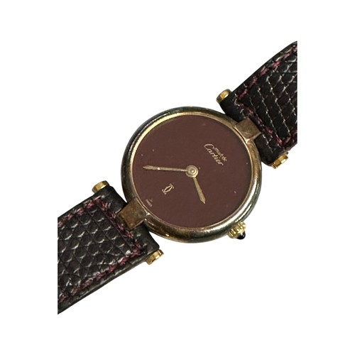 51 - CARTIER a ladies wrist watch, with brown face dial, and snakeskin strap, stamped to back Cartier Par... 