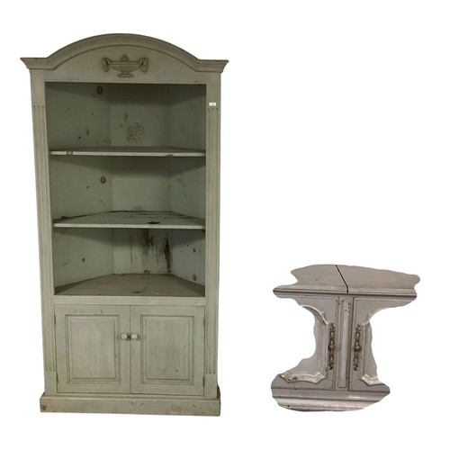 580 - A wooden painted corner cupboard with shelves, in the Adam taste, painted in a heritage moss green c... 