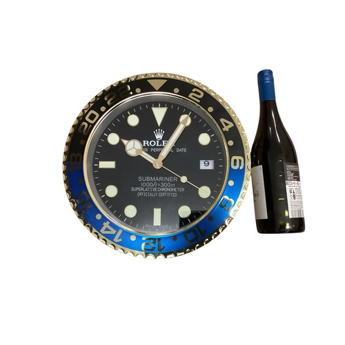 82 - Rolex inspired replica wall clock, Submariner style, black face, black and blue bezel. Condition as ... 