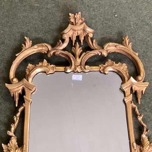 247 - A rectangular gilt wood hanging wall mirror, with some restoration to top finial, 94cm overall heigh... 