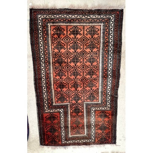 369 - Wool handmade rug with central pattern and border. Main colours are orange and brown. Condition- few... 