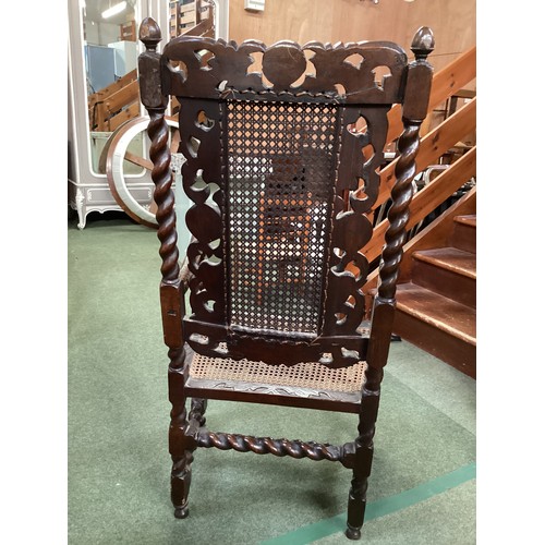 526 - Four chairs, to include a pair of Jacobean style bergere high back arm chairs, and two dining chairs... 