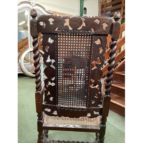 526 - Four chairs, to include a pair of Jacobean style bergere high back arm chairs, and two dining chairs... 