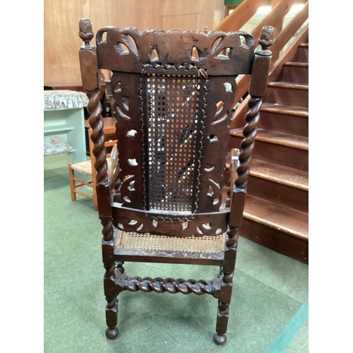 526 - Four chairs, to include a pair of Jacobean style bergere high back arm chairs, and two dining chairs... 