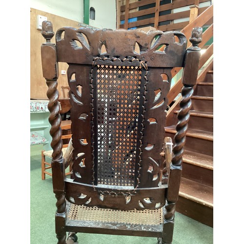 526 - Four chairs, to include a pair of Jacobean style bergere high back arm chairs, and two dining chairs... 