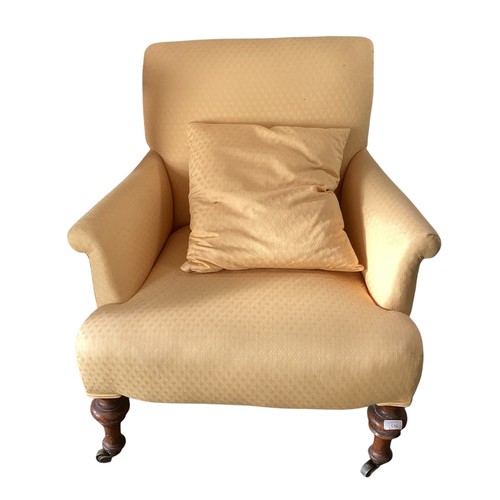 559 - A small yellow upholstered bedroom chair, on turned feet to castors, CONDITION REPORT: yellow chair ... 