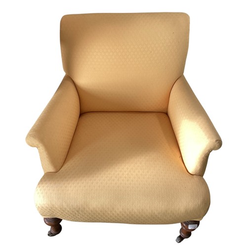 559 - A small yellow upholstered bedroom chair, on turned feet to castors, CONDITION REPORT: yellow chair ... 