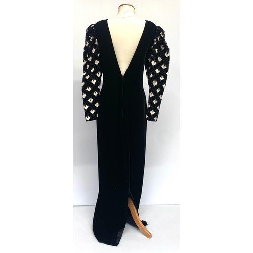 118 - Four dresses: Hardy Amies long black velvet evening gown with silk and velvet sleeves and bead drops... 