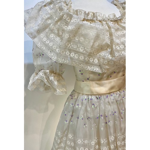 1 - BELLVILLE SASSOON, LONDON, An early 1980s 100% silk  ball dress with all over printed pattern to out... 