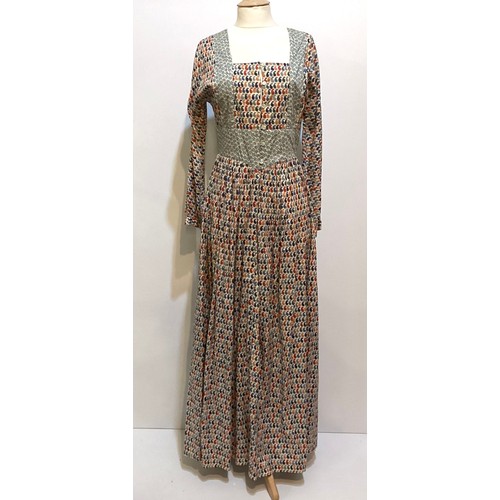 9 - Two printed cotton long dresses, 1970's, One labeled LIBERTY OF LONDON. The other Fabric by Liberty ... 