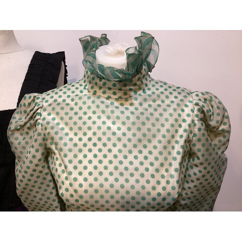 14 - A quantity of ANNACAT 1960's clothes to include a green spotted dress, black silk shirt, black lace ... 