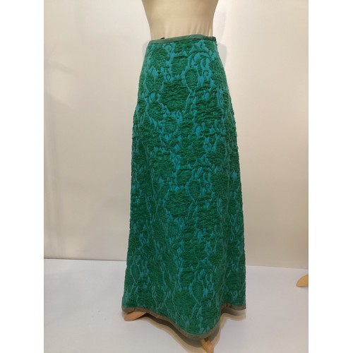 15 - TROUBADOUR long A line skirt with raised green wool pattern on turquoise back ground.  Age discolour... 