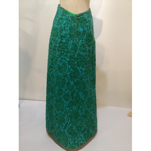 15 - TROUBADOUR long A line skirt with raised green wool pattern on turquoise back ground.  Age discolour... 