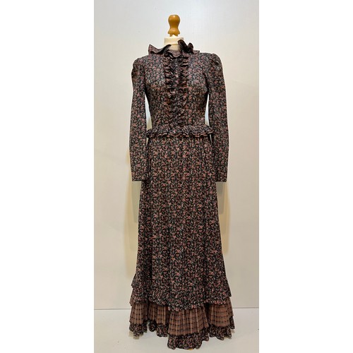 9 - Two printed cotton long dresses, 1970's, One labeled LIBERTY OF LONDON. The other Fabric by Liberty ... 