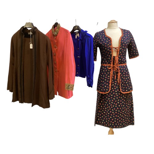 28 - A quantity of various clothes to include a THEA PORTER brown trouser suit with black braiding to tro... 