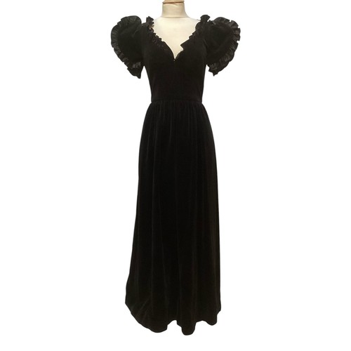 29 - A GINA FRATINI black cotton velvet evening dress with frill trim around neck and short sleeves. Labe... 