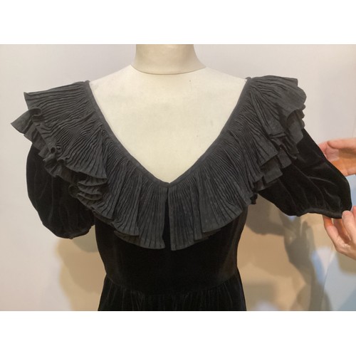 30 - Two 1980's ball dresses, to include black GINA FRATINI cotton velvet, with large frill neckline, a G... 