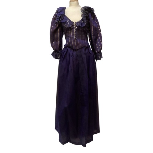 31 - CAROLINE CHARLES, a purple silk skirt and shirt with gold thread pattern, labelled  European size  3... 