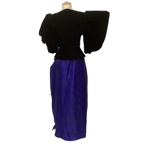 31 - CAROLINE CHARLES, a purple silk skirt and shirt with gold thread pattern, labelled  European size  3... 