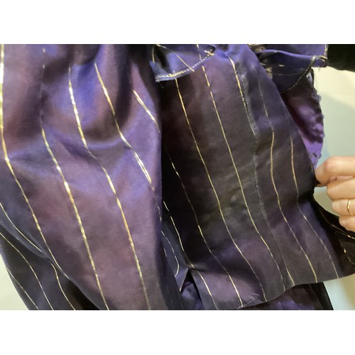 31 - CAROLINE CHARLES, a purple silk skirt and shirt with gold thread pattern, labelled  European size  3... 