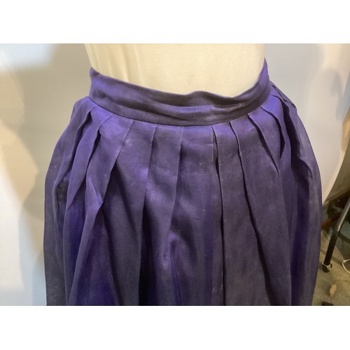 31 - CAROLINE CHARLES, a purple silk skirt and shirt with gold thread pattern, labelled  European size  3... 