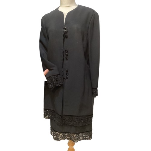 35 - WIM HEMMINK:  1980's, a black suit with bead embroidered lace to skirt and jacket with black buttons... 