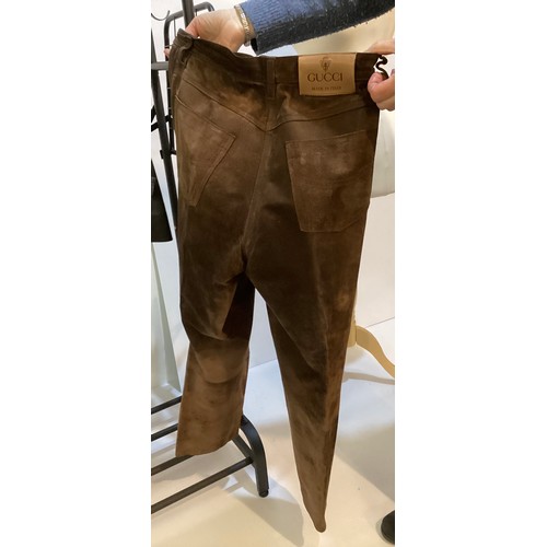 37 - A quantity of trousers, GUCCI suede (size 44 well worn and marks), JAEGER light fawn suede trousers ... 