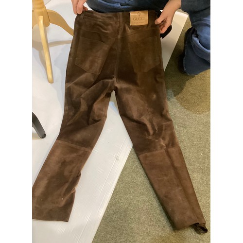 37 - A quantity of trousers, GUCCI suede (size 44 well worn and marks), JAEGER light fawn suede trousers ... 