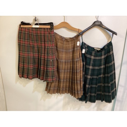 41 - A quantity of tweed skirts/kilts to include mainly JAEGER and ELCH (5 items one with matching shawl)... 