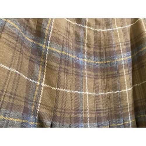 41 - A quantity of tweed skirts/kilts to include mainly JAEGER and ELCH (5 items one with matching shawl)... 