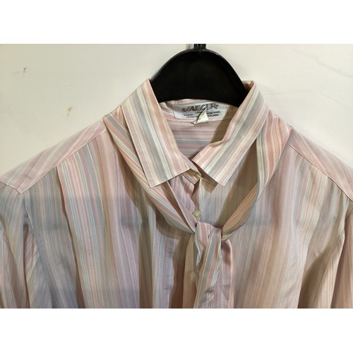 44 - Six silk JAEGER shirts/tops, and ESCADA pale blue silk top.