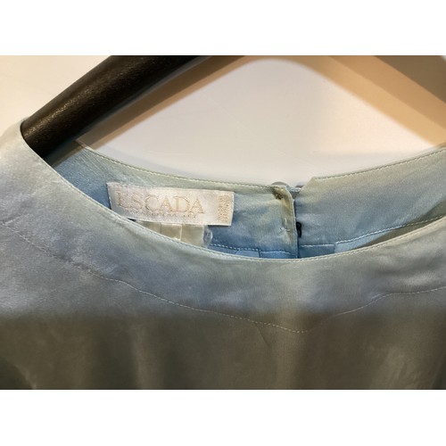 44 - Six silk JAEGER shirts/tops, and ESCADA pale blue silk top.