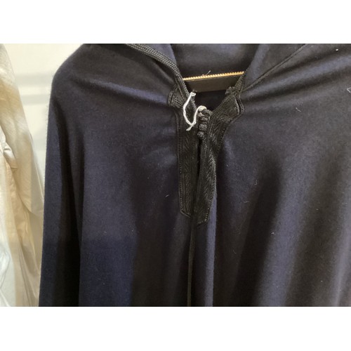 49 - A quantity of Moroccan and Moroccan style clothes to include SAINT LAURENT black wool cape with hood... 