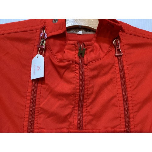 50 - HERMES, Paris, Boutique Sport, circa 1970'S, red all in one ski suit/jump suit, with H center front ... 