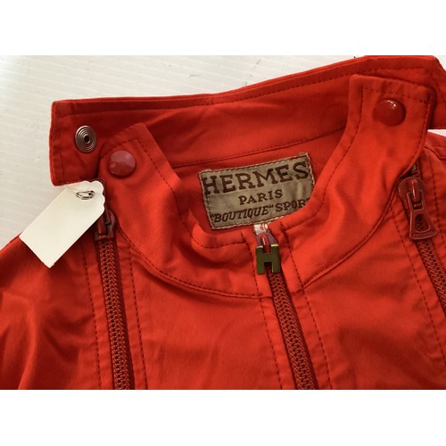 50 - HERMES, Paris, Boutique Sport, circa 1970'S, red all in one ski suit/jump suit, with H center front ... 