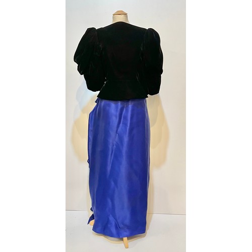 31 - CAROLINE CHARLES, a purple silk skirt and shirt with gold thread pattern, labelled  European size  3... 