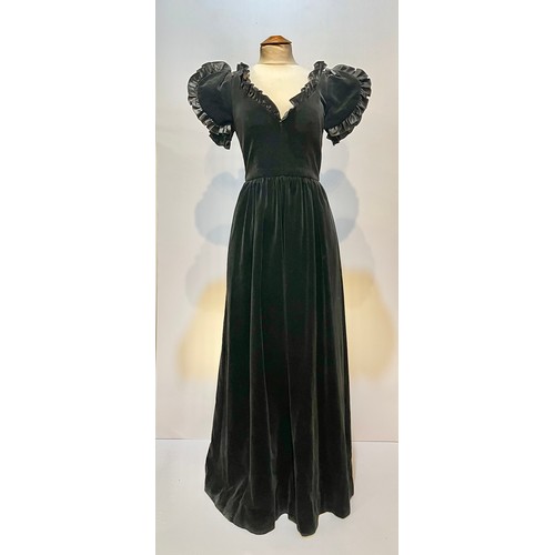 29 - A GINA FRATINI black cotton velvet evening dress with frill trim around neck and short sleeves. Labe... 