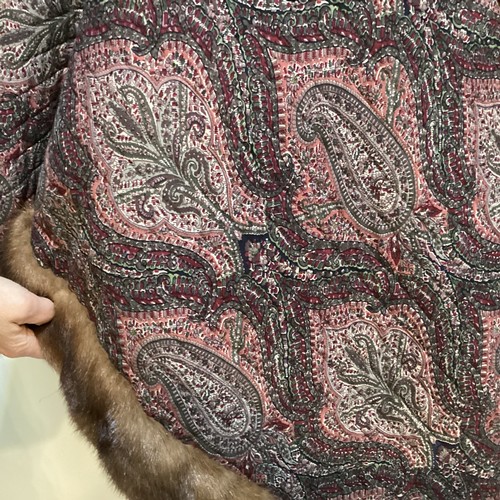 78 - A paisley quilted cotton shawl/jacket with fur edges, no label. No sign of damage, and a wool shawl ... 