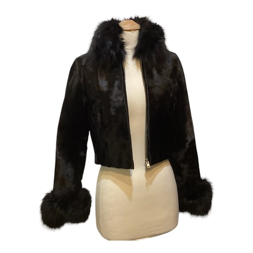 81 - A Maxwell Croft London/Bath Broadtail small short jacket with fur collar and cuffs. No sign of damag... 