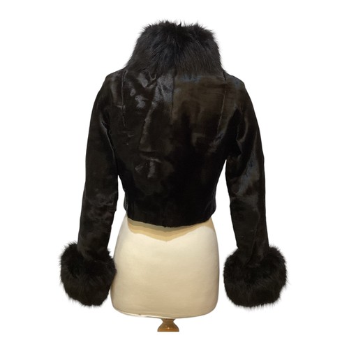 81 - A Maxwell Croft London/Bath Broadtail small short jacket with fur collar and cuffs. No sign of damag... 