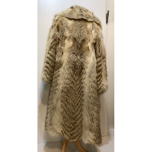 82 - A long fur coat, monogrammed, Patricia, to inside see all photos.