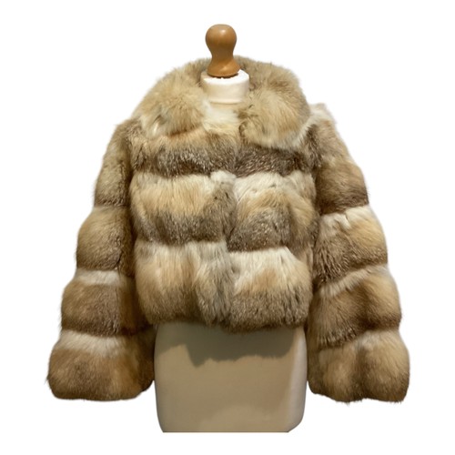 86 - A short fur coat, lined, some minor marks to lining, and a long fur coat with wear and losses to fro... 