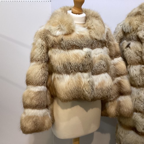 86 - A short fur coat, lined, some minor marks to lining, and a long fur coat with wear and losses to fro... 