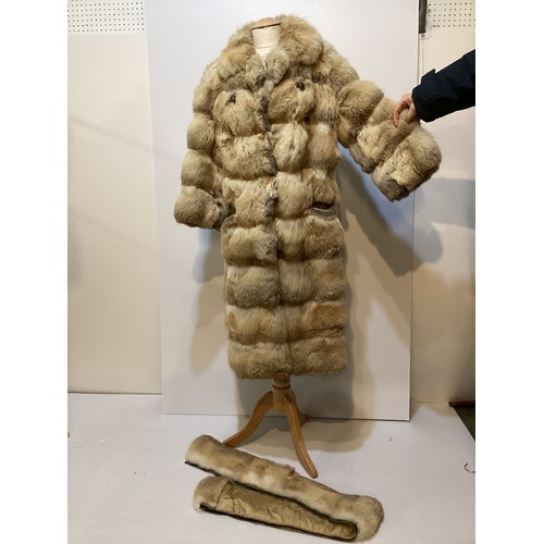 86 - A short fur coat, lined, some minor marks to lining, and a long fur coat with wear and losses to fro... 