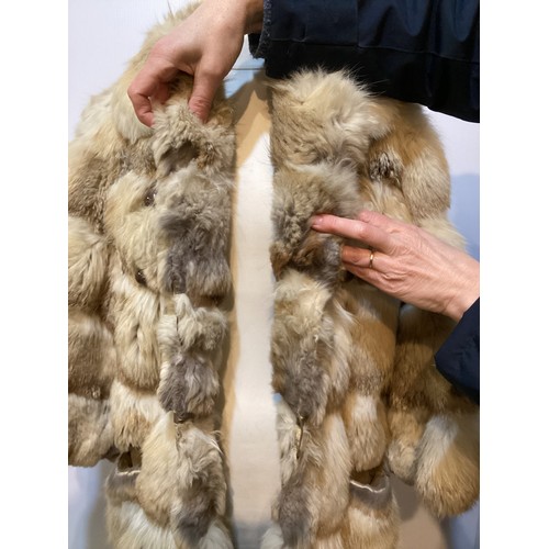 86 - A short fur coat, lined, some minor marks to lining, and a long fur coat with wear and losses to fro... 