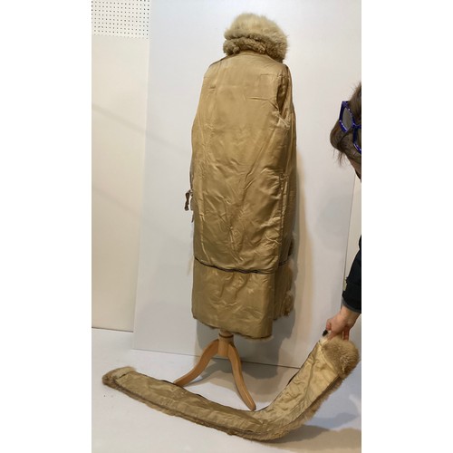 86 - A short fur coat, lined, some minor marks to lining, and a long fur coat with wear and losses to fro... 