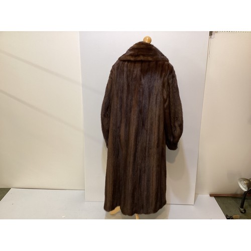 96 - A long brown fur coat with balloon sleeves and large shawl style collar. Monogrammed MAR. Condition ... 